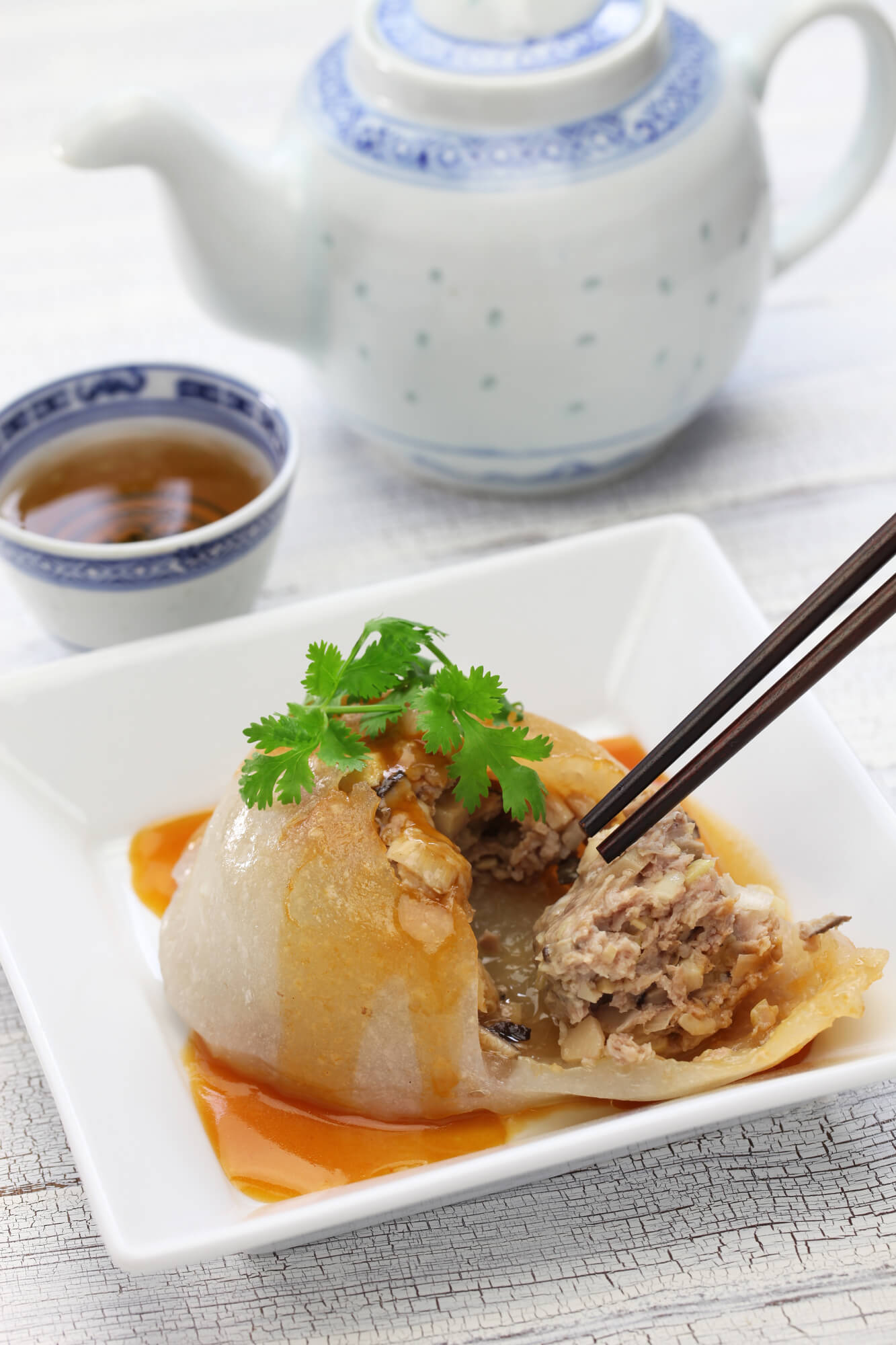 A large Ba-Wan, a tasty gelatinous Taiwanese dumpling that is both sweet and savoury.