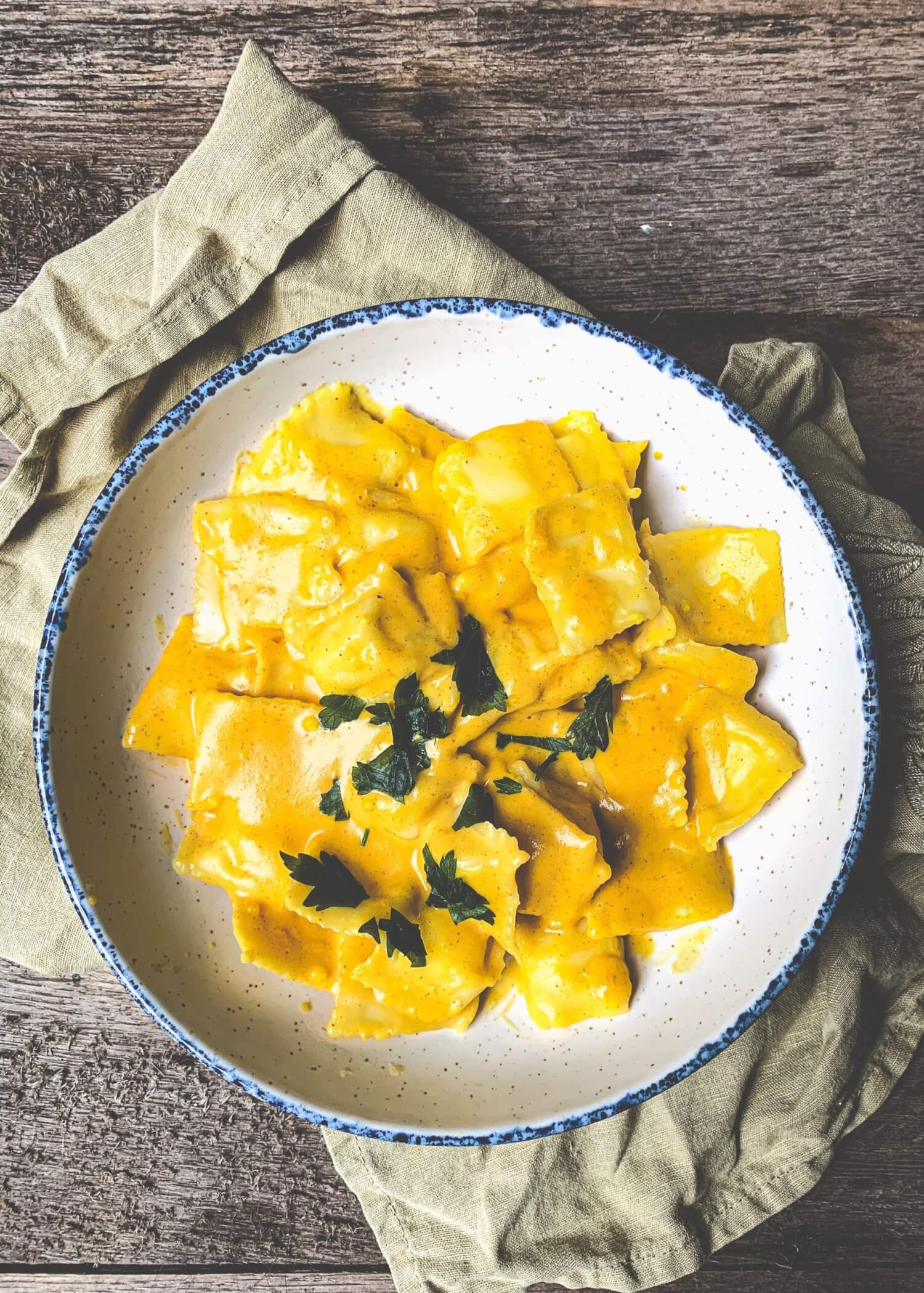 A plate of delicious Italian stuffed pasta (known as ravioli).